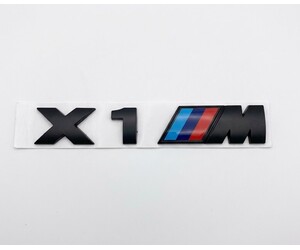 Αυτοκόλλητο μεταλλικό μαύρο 15.5x2.7cm - Bmw X1 M